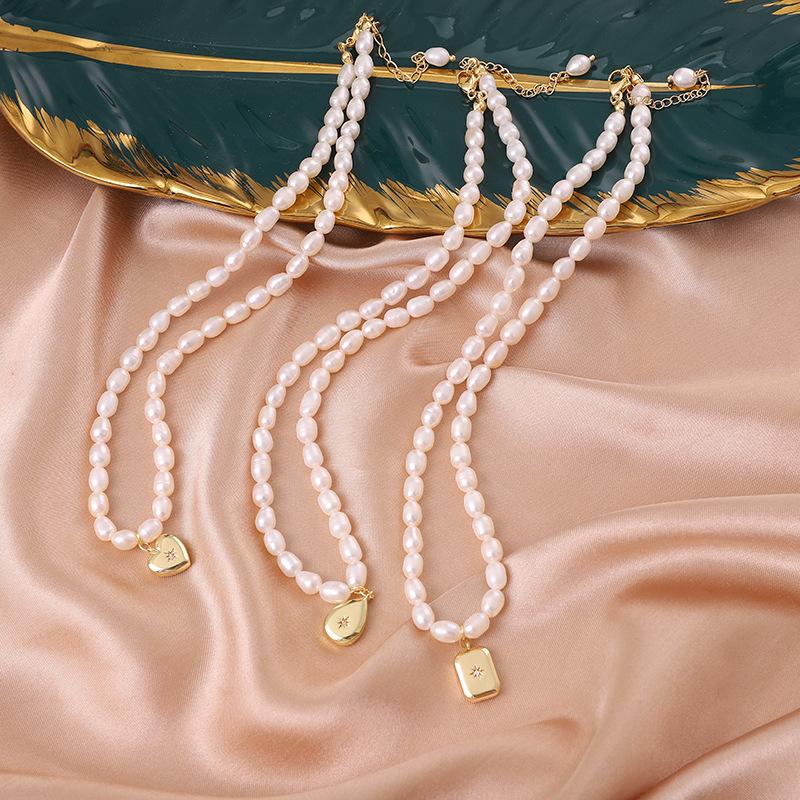 Natural freshwater pearl necklace, star heart pendant, pearl necklace, niche design, high-end sweater chain.