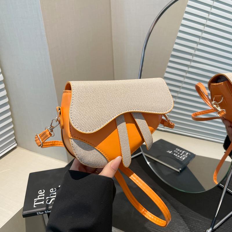 Fashion Trend Design Sense Niche Women's Bag Shoulder Messenger Bag Special-shaped Contrasting Color Splicing Saddle Bag