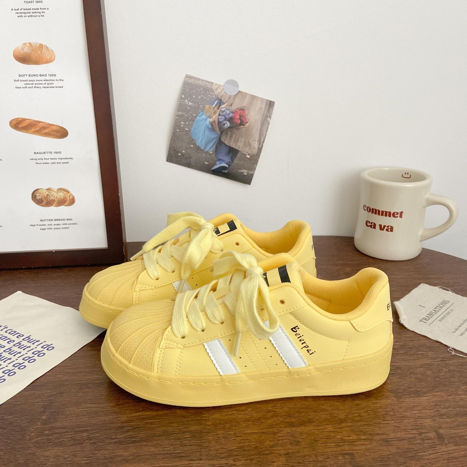 

Milk white thick baseplate shoes shell head spring new niche round head casual sports sub 40
