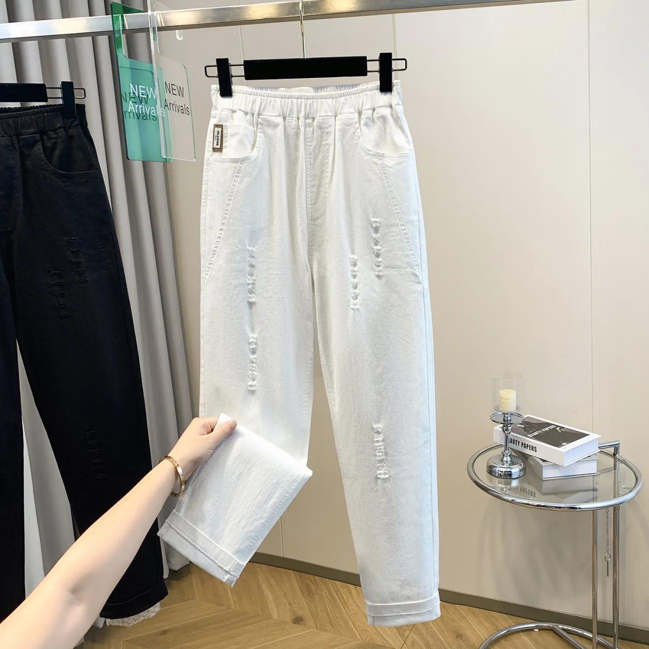 

Весна и Лето Большой Размер Брюки-Гаремы Рваные Джинсы Свободные Толстые ММ Западный Стиль Эластичная Талия Девятиточечные Морковные Брюки XXXXXL белый