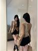 Elegant Leopard Print Waist-Cinching Long-Sleeve Pleated Top with Ribbon Detail