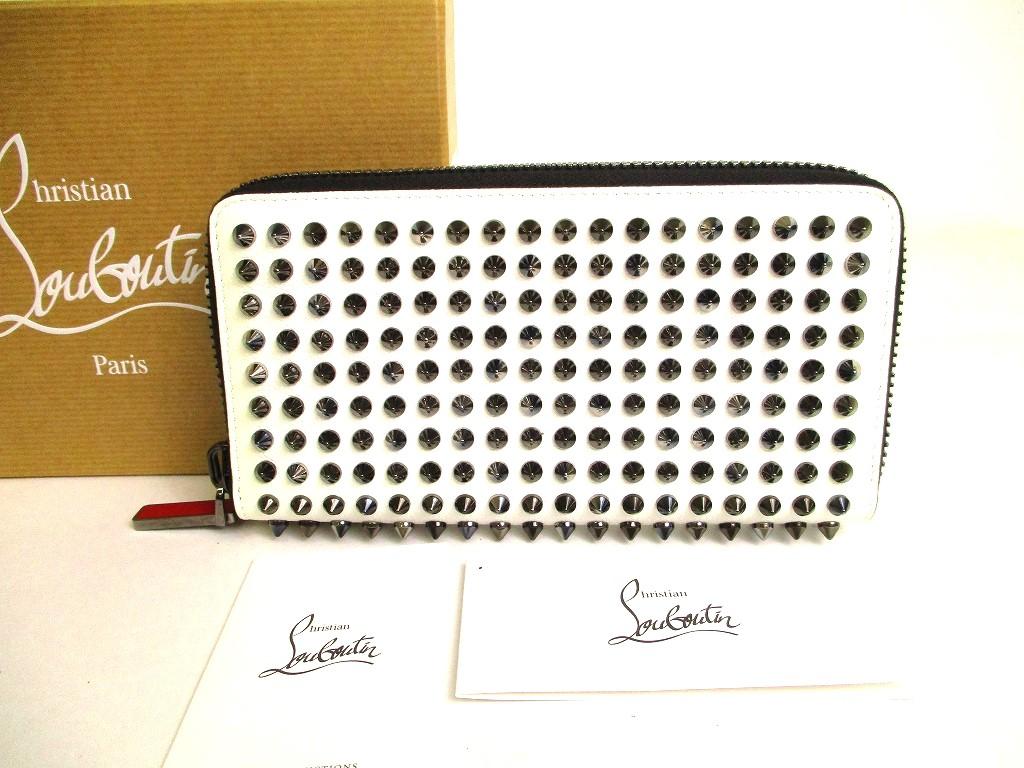 

Автентичний гаманець Christian Louboutin Panettone із білими шкіряними шипами на круглій блискавці №9934 відремонтований