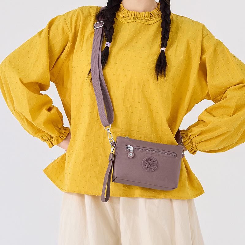 2026 Frühling Damen Wasserdichte Nylon Schultertasche Crossbody Tasche mit Münzfach mit mehreren Fächern