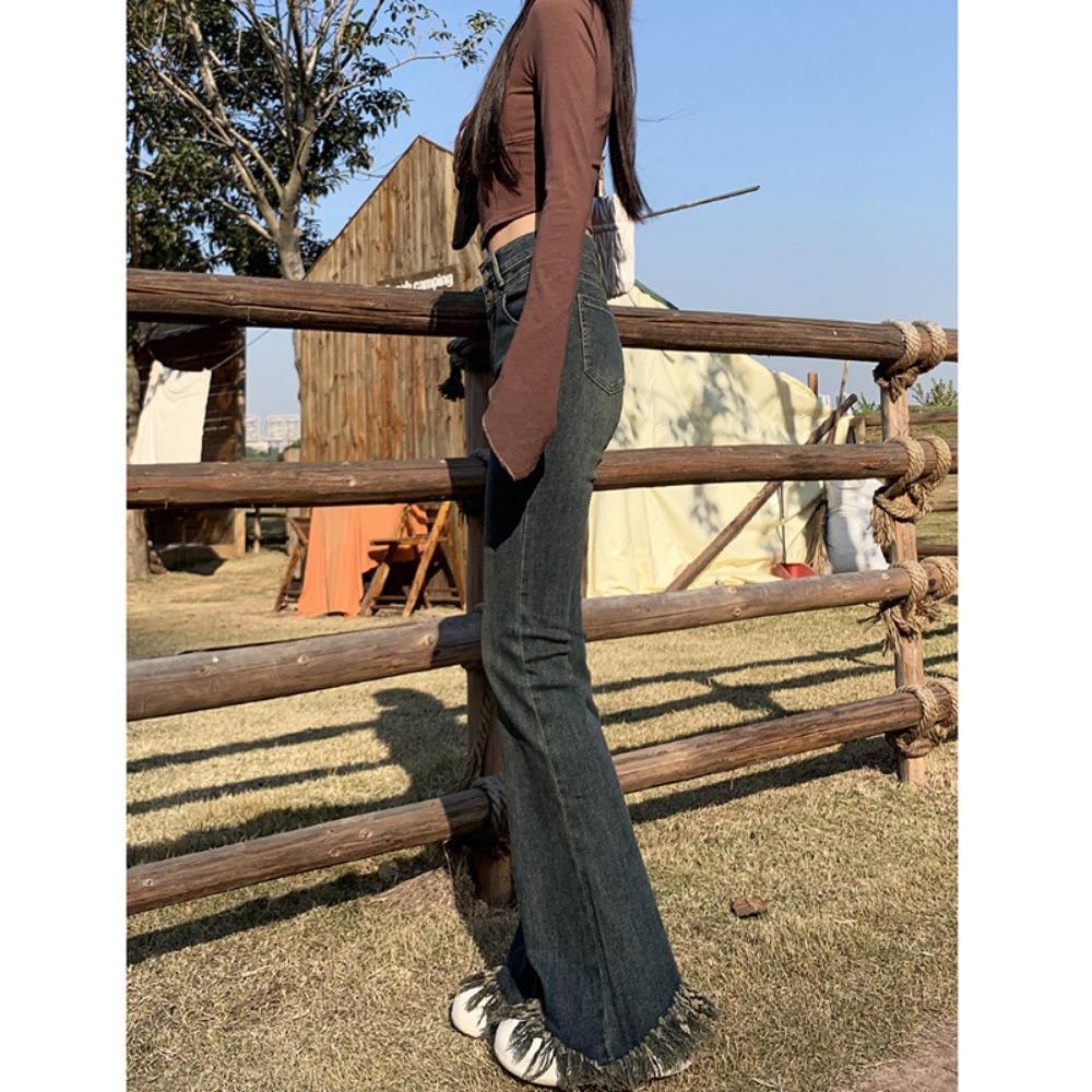 Slight jeans women's autumn and winter new rough-edged horseshoe pants versatile high-waisted thin fringed flared pants tide