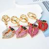 Custom Rhinestone Lipstick Keychain: European & American Women's Lip Bag Charm Pendant
