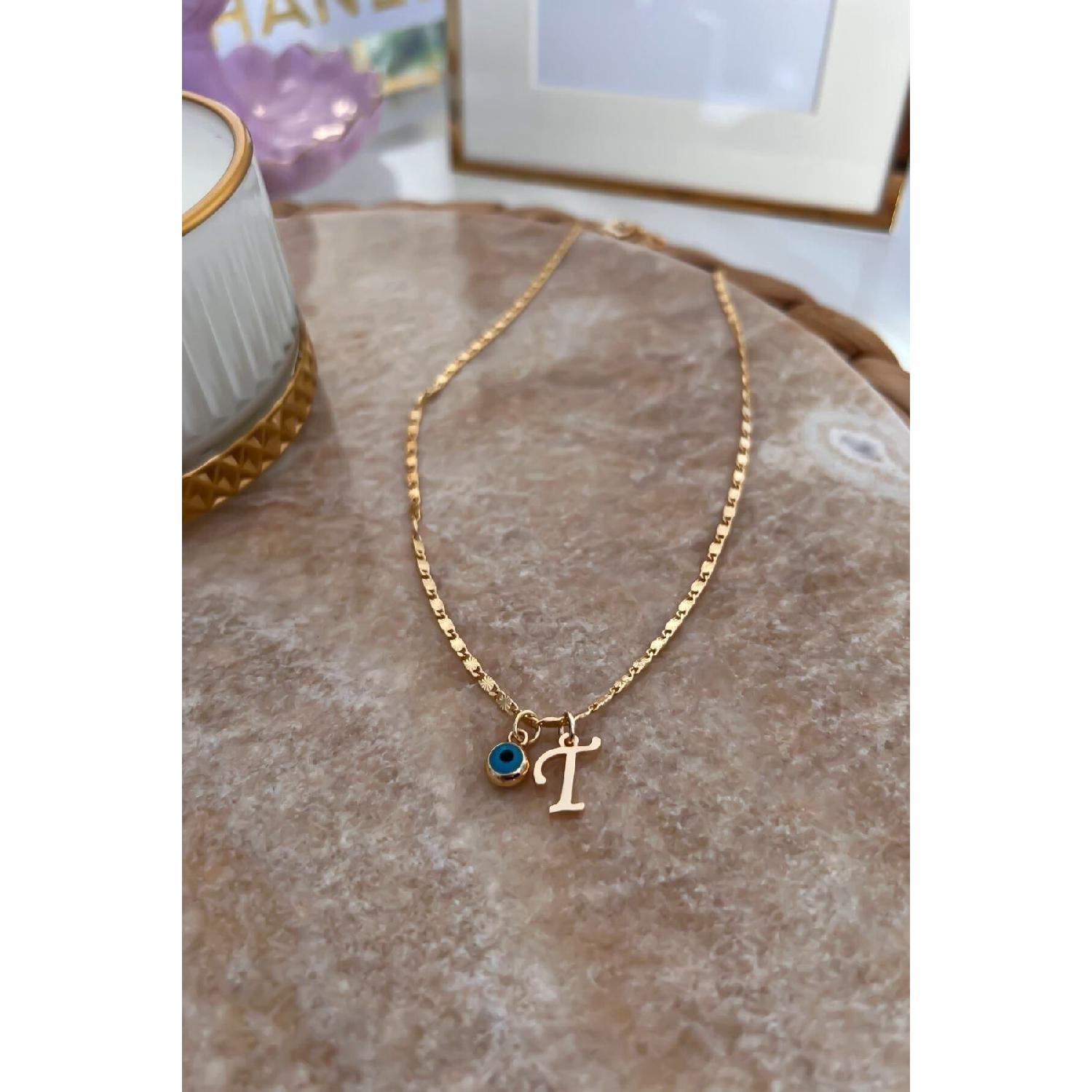 

Намисто на тонкому ланцюжку з літерою T і підвіскою «Лихе око». 50 cm