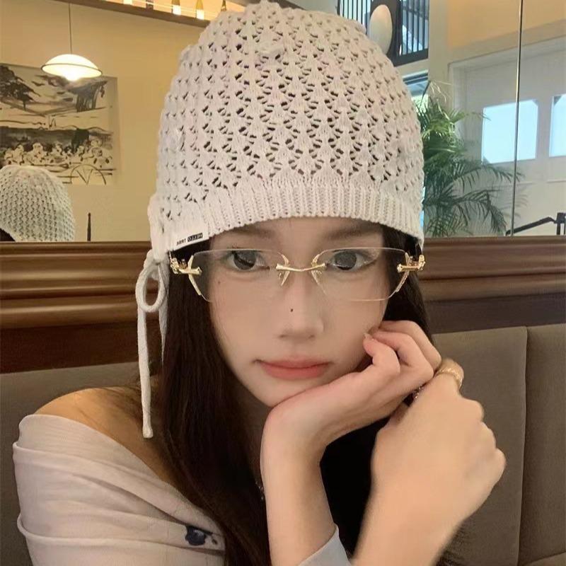 Women's Rimless Myopia Glasses: Anti-Blue Light, Metal Craft, Retro Style for Trendsetters.