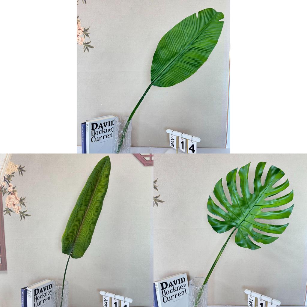 Dekoration i form av en falsk bananbladsfläkt för bröllop och heminredning