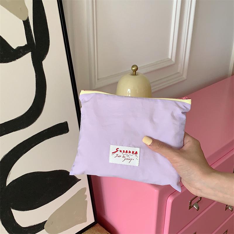 Korean niche design ice cream color cosmetic bag small object storage bag letter clutch bag change bag