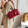 Simple retro underarm bag women's 2025 winter new niche portable commuter shoulder bag