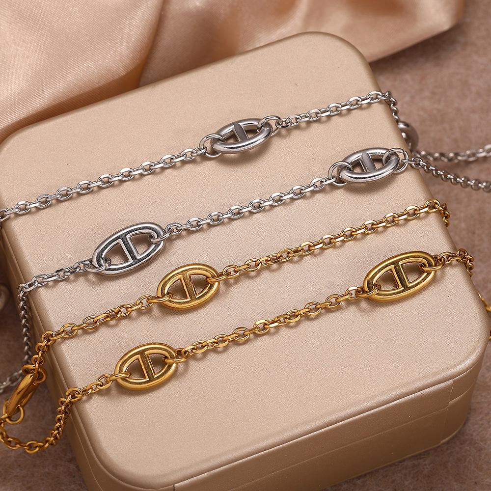 Versatile Light Luxury Titanium Steel Women's Necklace with OT Buckle - Long Chain Pig Nose Design Temperament Accessory.