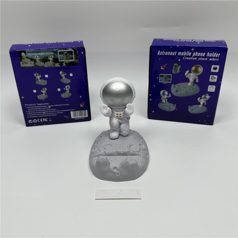 Astronaut Figurine Phone Holder: Creative Plastic Desktop Decor & Gift