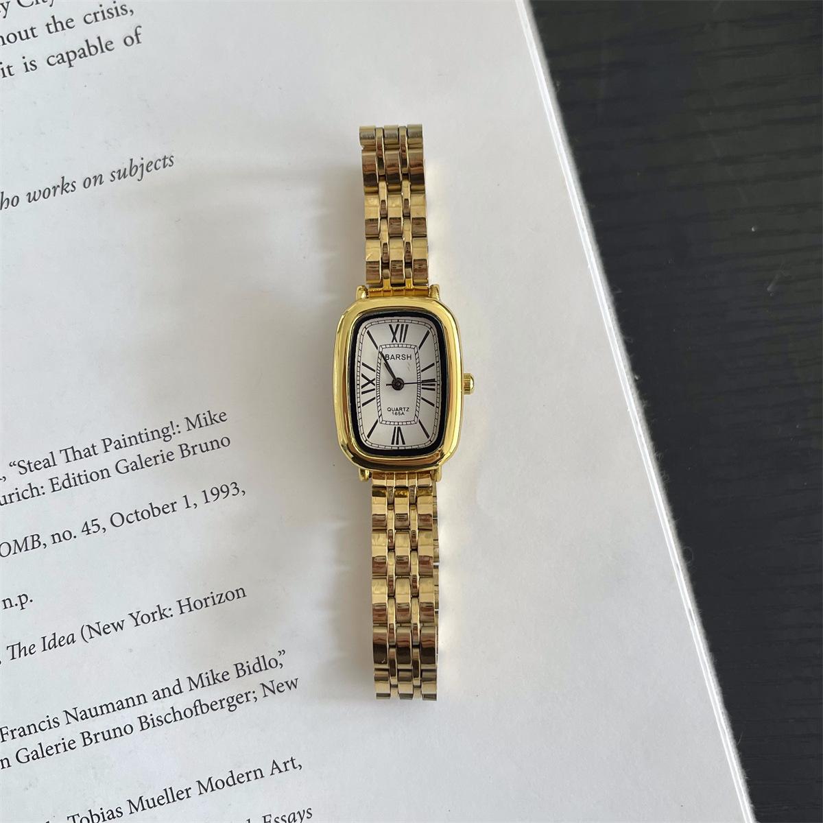 Medieval Oval Steel Belt Small Gold Watch Watch Female Student Fashion Chain White High-End Quartz Watch