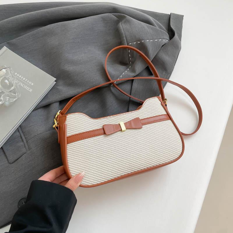 

Премиальная текстура темперамент универсальная женская сумка весна новая мода атмосфера плечевая подмышечная сумка-мессенджер белый