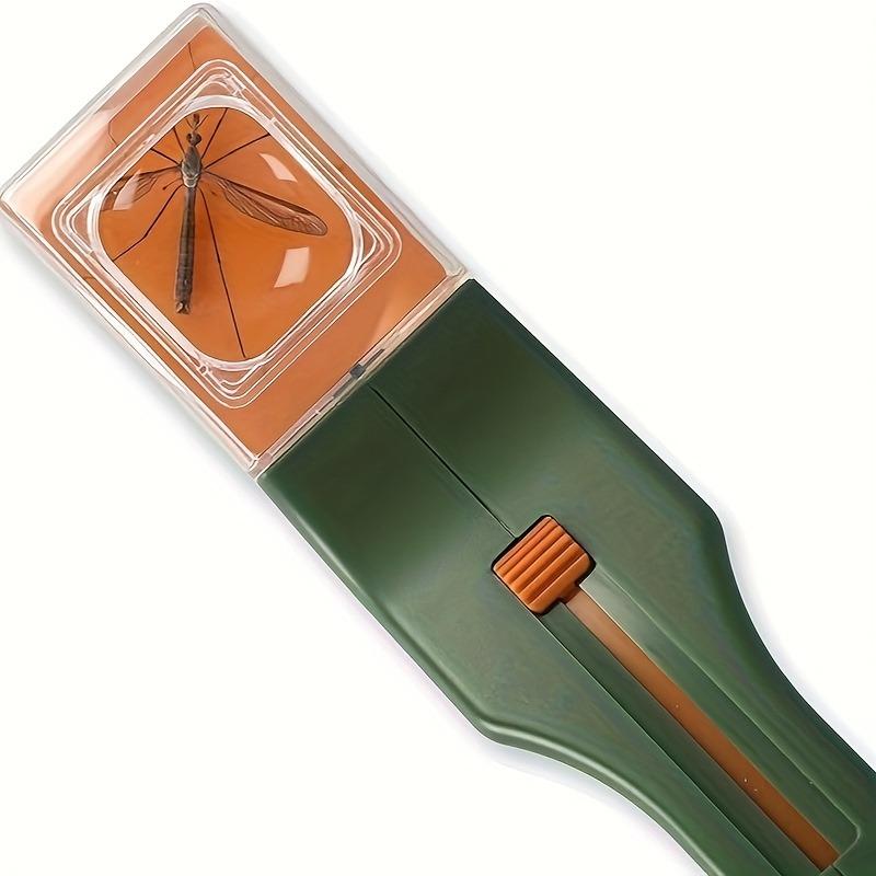 A handheld insect spotter with a transparent window for outdoor exploration. Gardening and nature research are ideal for backyard adventures
