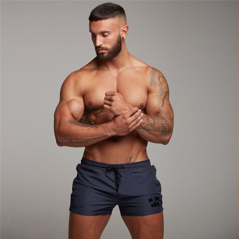 Muscleguys Letní novinka Workout Mens Beach Board Shorts Slim Fitness běžecké šortky rychleschnoucí