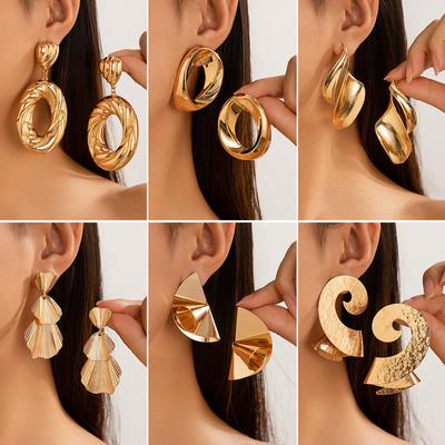 Personalized Metal Geometric Texture Hollow Stud Earrings Women Irregular Twist Glossy Earrings Earrings