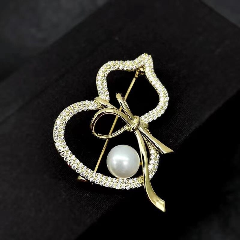 

Высококачественная микро-инкрустированная циркониевым жемчугом тыквенная брошь Fulu символизирует элегантность и темперамент Женские аксессуары