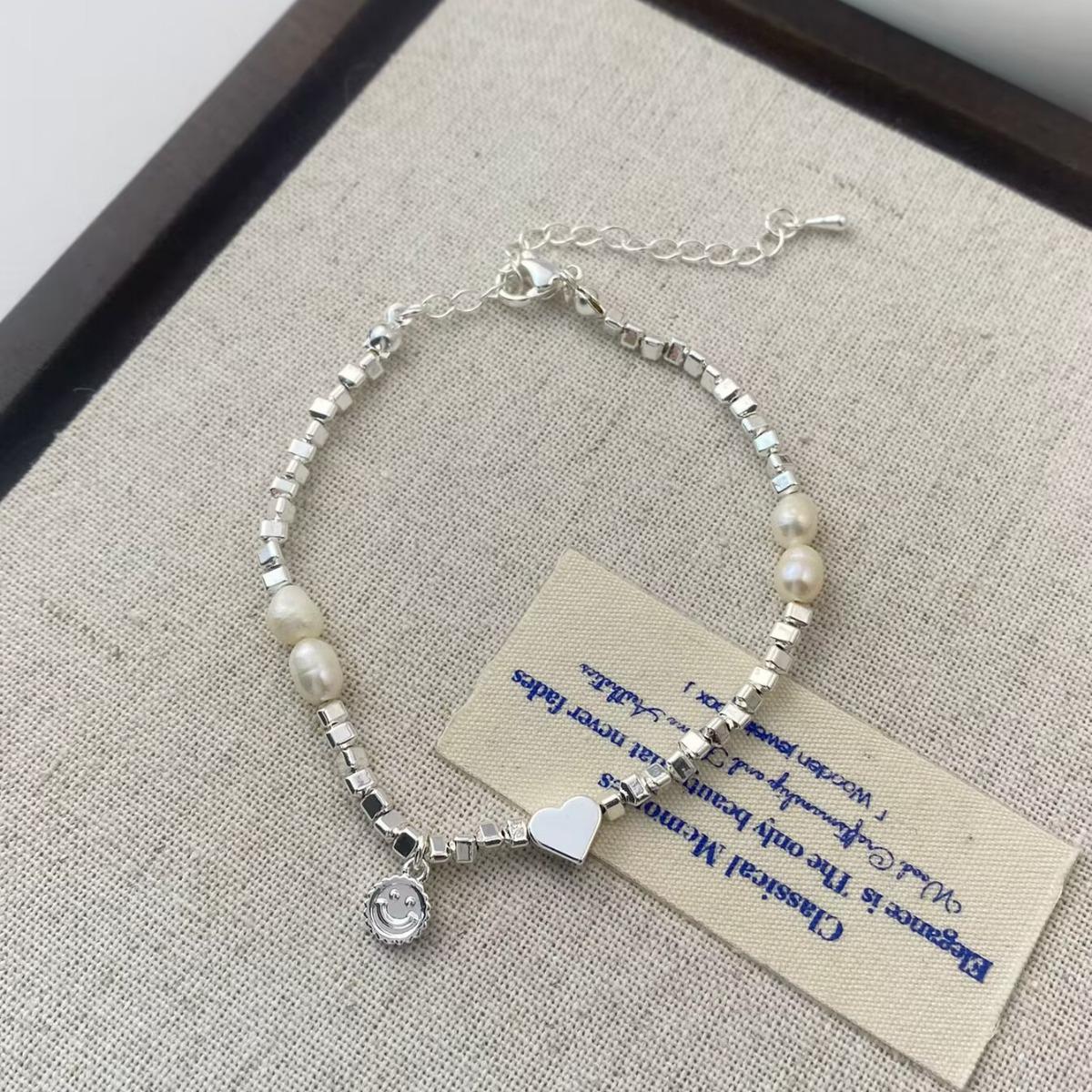 Elegant Freshwater Pearl & Silver Heart Bracelet with Cute Smiley Face - Chic and Versatile Hand Jewelry Design