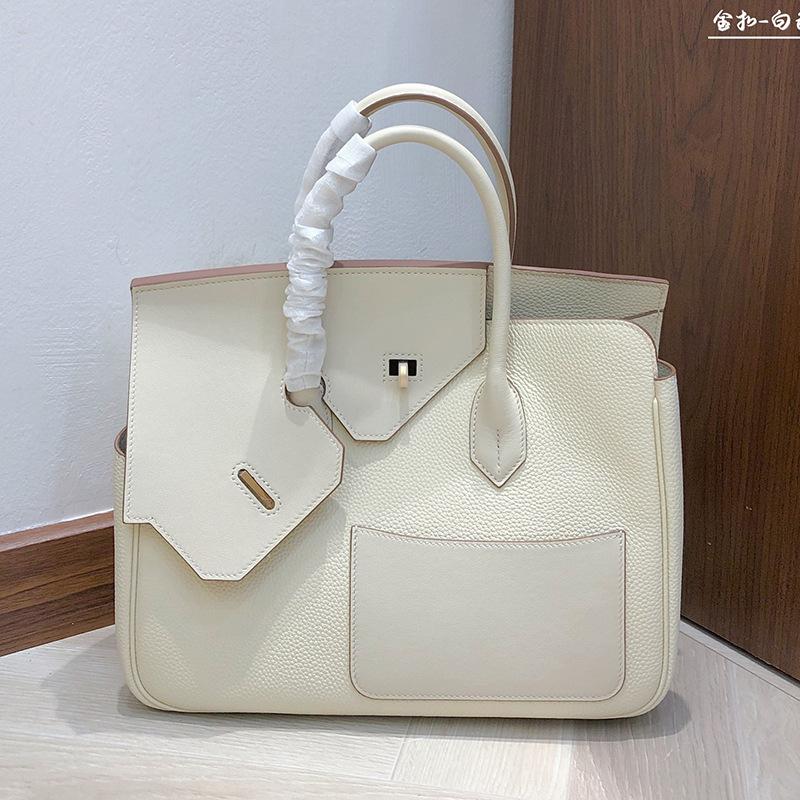 2025 Neuer Stil Reißverschluss Ledertasche 30cm Doppelseitig Unregelmäßig Echtes Leder Damenhandtasche High-End Handgefühl Henkeltasche