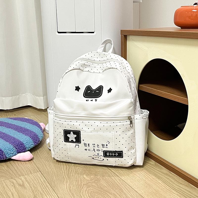 Polka Dot Graffiti Backpack - Cute, Lightweight, and Versatile Schoolbag