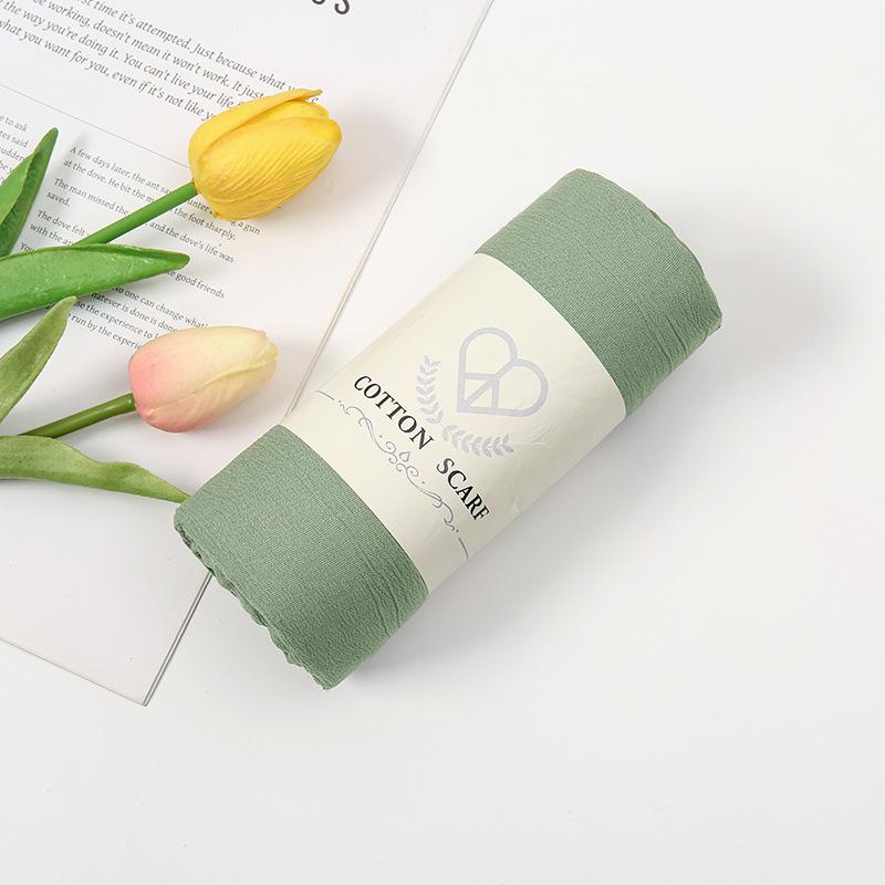 Autumn and winter new micro-elastic crumpled cotton blended long towel right angle lock edge polyester headscarf hot-selling solid color scarf