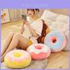 Almofada de pelúcia em formato de donut, fofa e ideal para decoração de casa e assento confortável.
