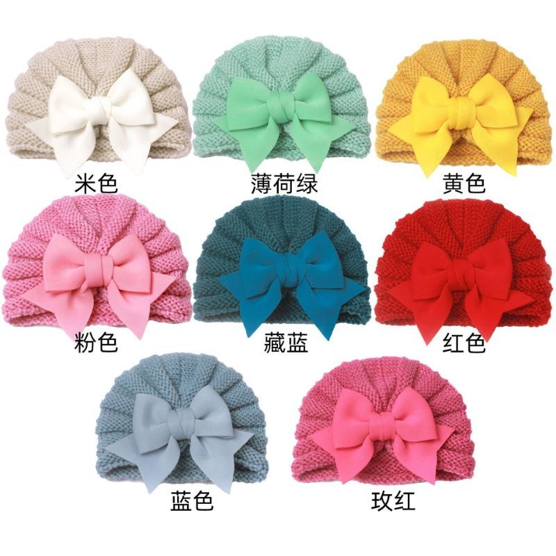 

Autumn and winter children s warm knitted hat, baby bow Indian hat, baby wool hat