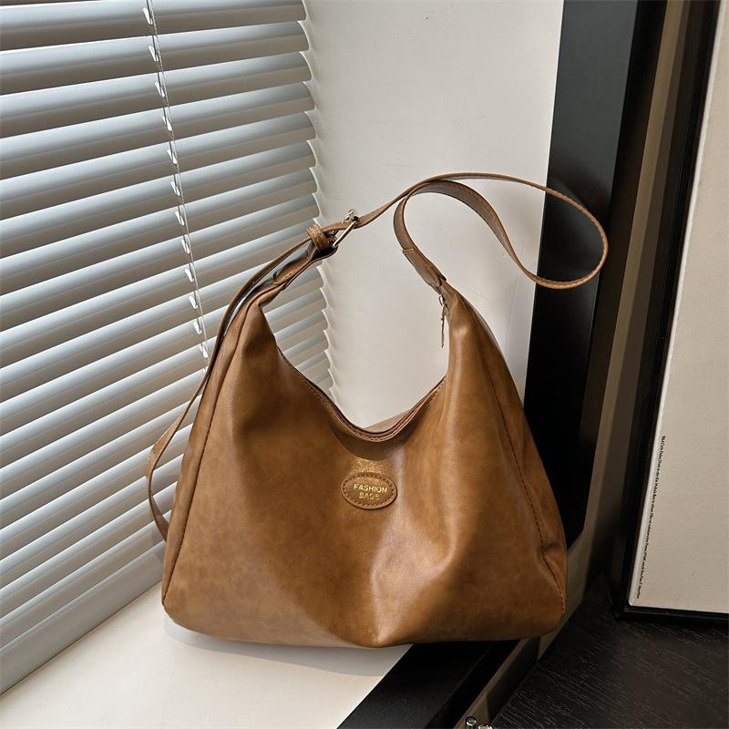 2025 New Women's Dumpling Bag High-end Simple Fashion Daily Wear Casual Commuting Large-capacity Tote Bag