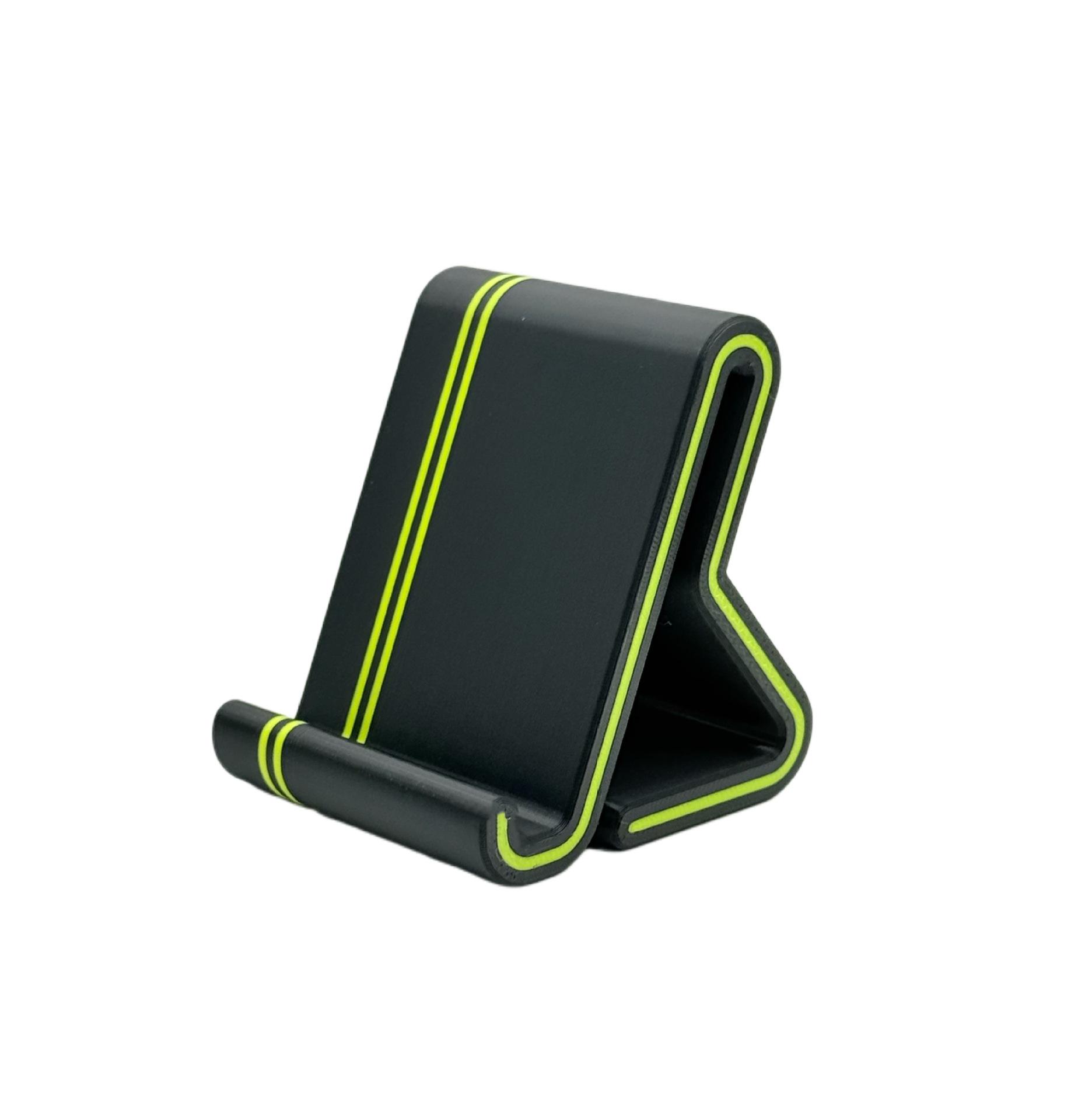 

3D Printed Multifunctional Phone Holder: Portable Desktop Stand for Home, Office & Streaming