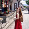 LC Yunnan Dali wears a French red suspender dress, female sexy backless, suitable for seaside vacation