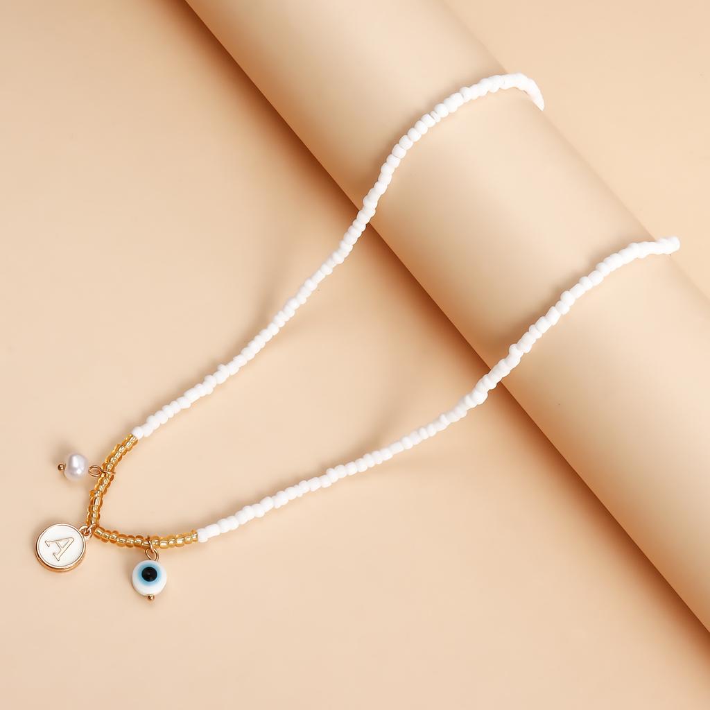 Exclusive, Bohemian White Rice Bead Beaded Necklace, Ethnic Style Alphabet Eye Pendant Necklace