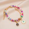 Beach Bohemian Multi-Layer Bracelet: Colorful Polymer Clay with Coin, Sun, and Eye Charms