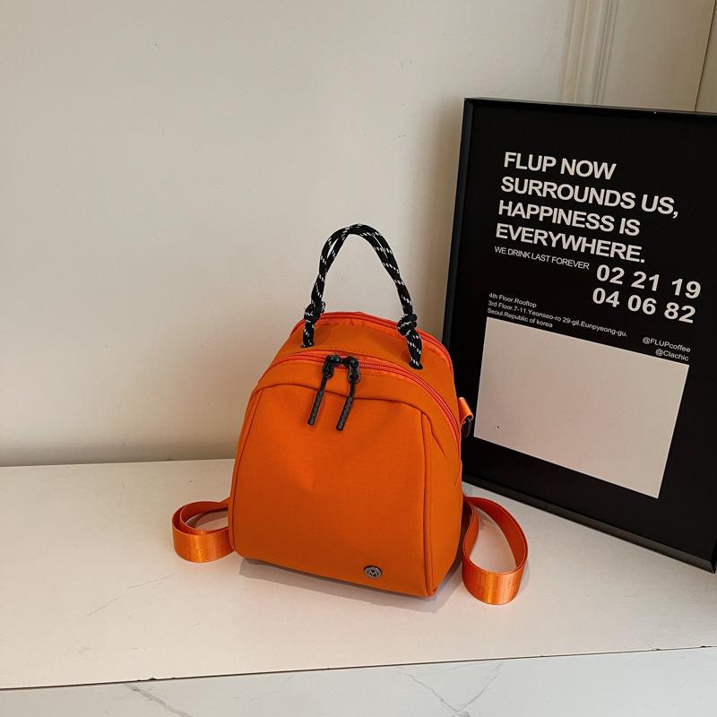 Fashion sense small backpack women's lightweight casual shoulder bag new fashion commuter shell bag simple commuter messenger bag