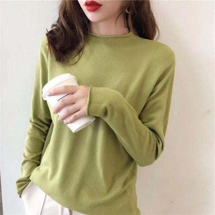 Für Schüler im Herbst und Winter kann das Tragen eines Strickpullovers als Innenschicht sie schlanker aussehen lassen.