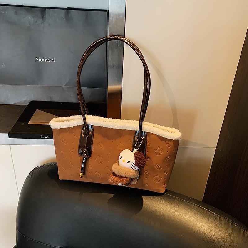 

2025 autumn and winter new retro shoulder bag fashion casual personalized bag niche women large capacity tote bag Without pendant коричневый