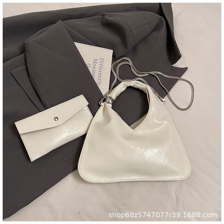 

Niche design portable small bag women s 2025 new fashion versatile underarm shoulder bag commuting temperament hand bag