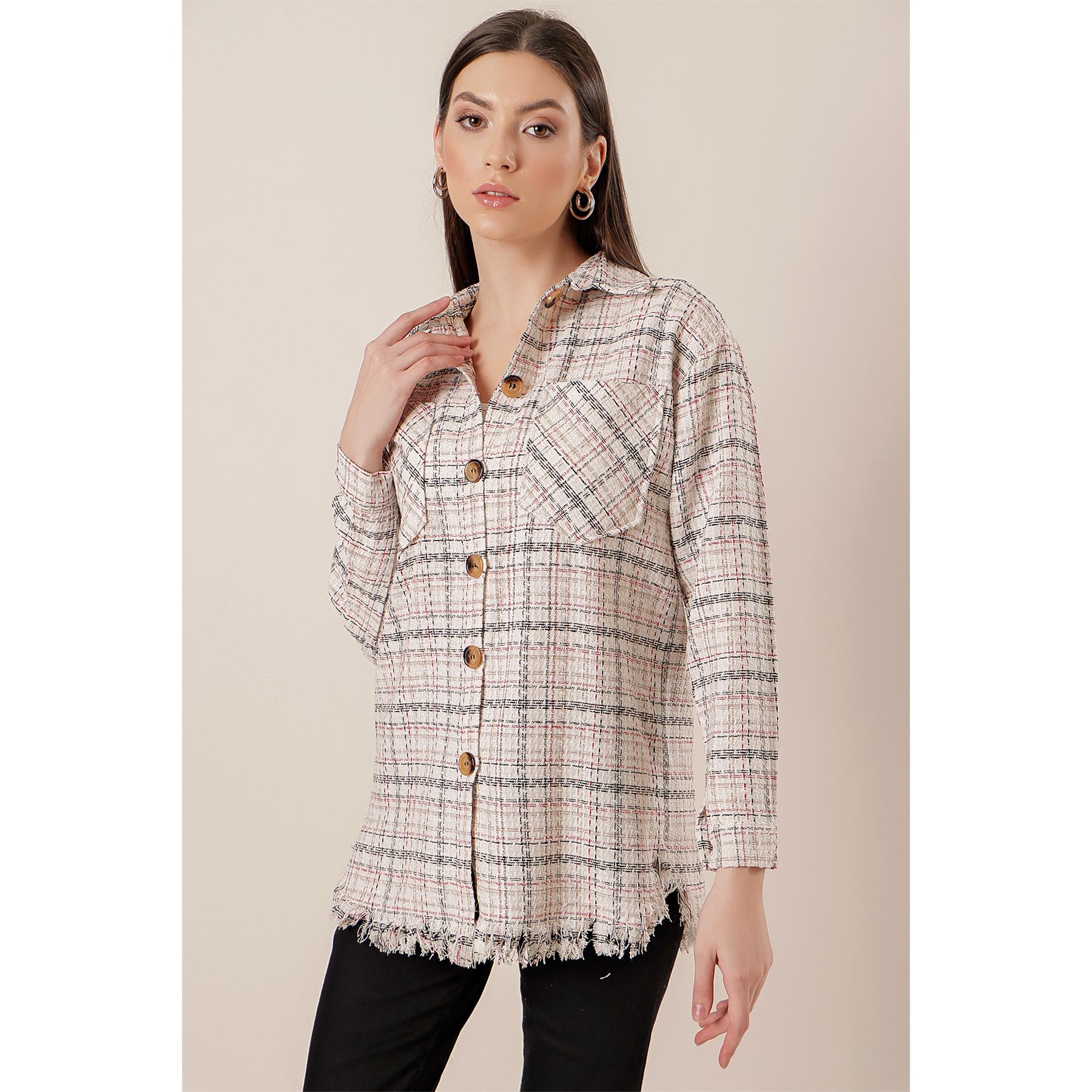 

Клетчатая рубашка Şanel с юбкой с кисточками