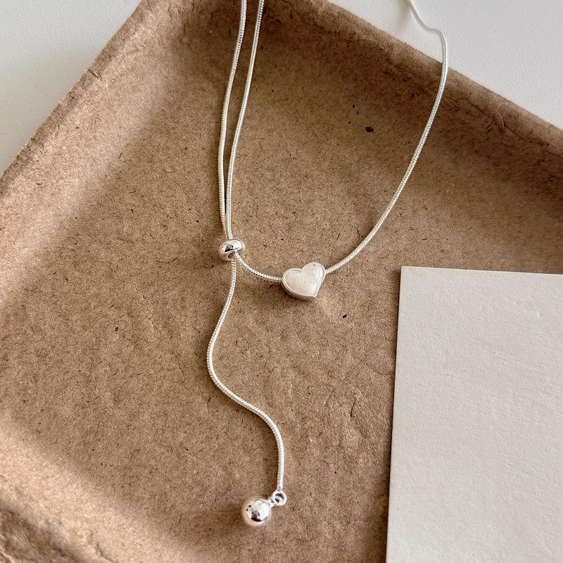 Exquisite Minimalist Silver Heart Pendant Necklace for Women - Light Luxury Clavicle Chain with Cool Style