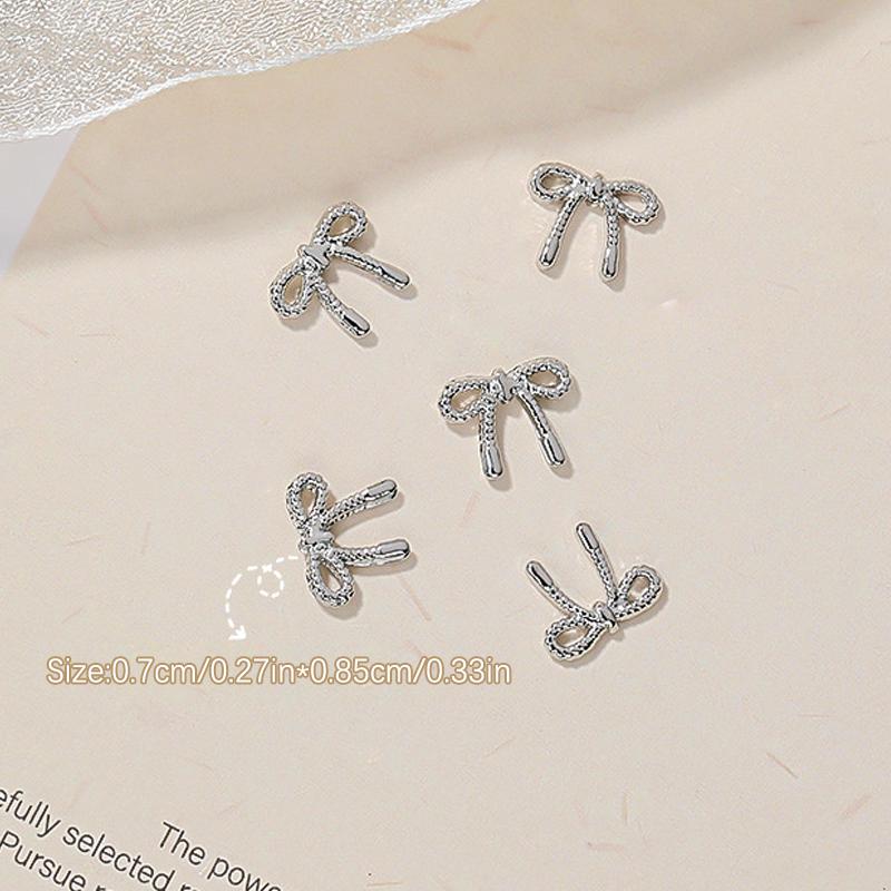 

5 Pcs 3D Alloy Bow Nail Art Charm Ribbon Bowknots Nail Accessories For Women Girls Nail Decorations Diy Craft Jewelry (4 Styles) as the picture
