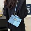 Color Block Kelly Bag: Trendy Two-Tone, Large Capacity, Versatile Shoulder & Crossbody Bag for Work Commute.