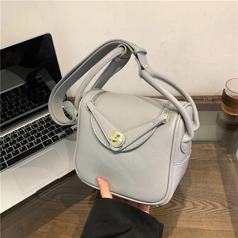 Bolso de hombro PU monocromático para mujer bolsos con línea de costura con cremallera suave   a la moda