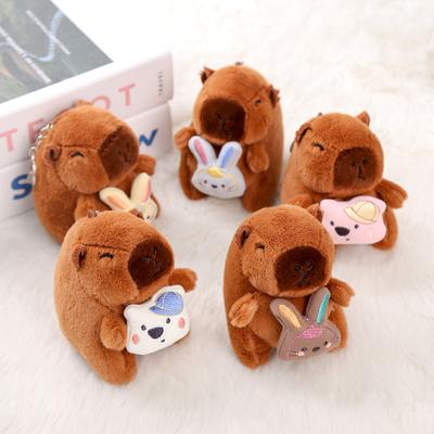 Kapibara bebek oyuncak kapibara bebek tavşan ayı tutuyor peluş bebek çanta kolye kapibara anahtarlık