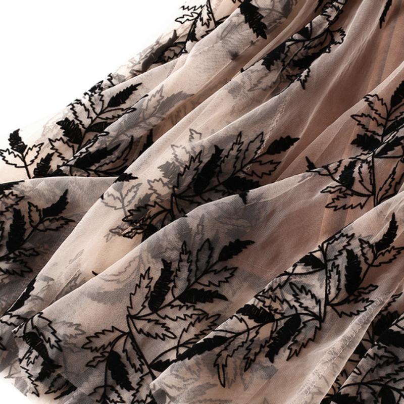 Saia de gaze estampada flocada saia feminina outono comprimento médio uma linha saia grande saia de malha floral saia longa