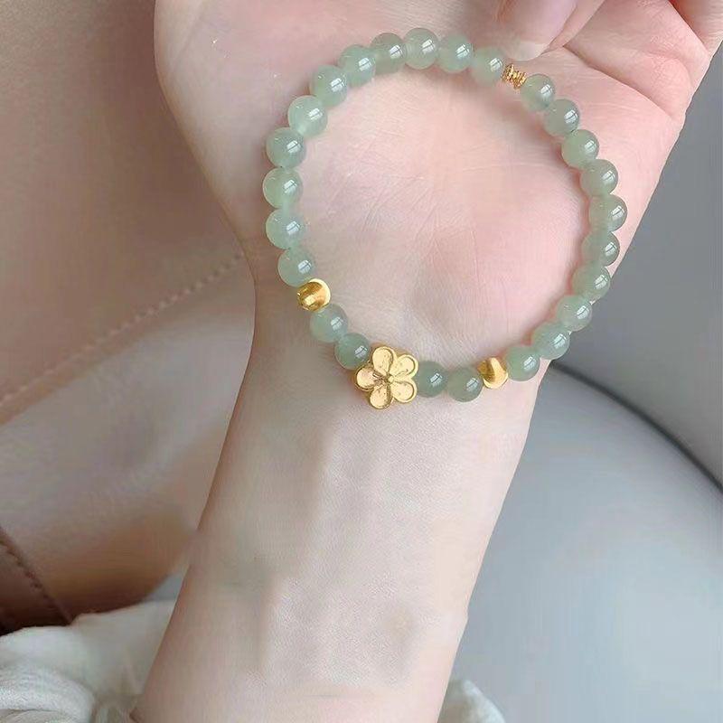 

Qingshui Peach Blossom Elegant Bracelet: Romantic Gift for Women, Sweet Design, Perfect for Friends and Students.
