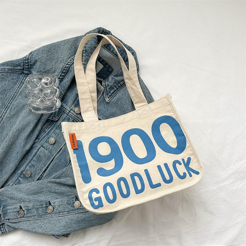 Stylish Large Capacity Canvas Bag For Kids With Trendy Letter Design Versatile And Practical синий