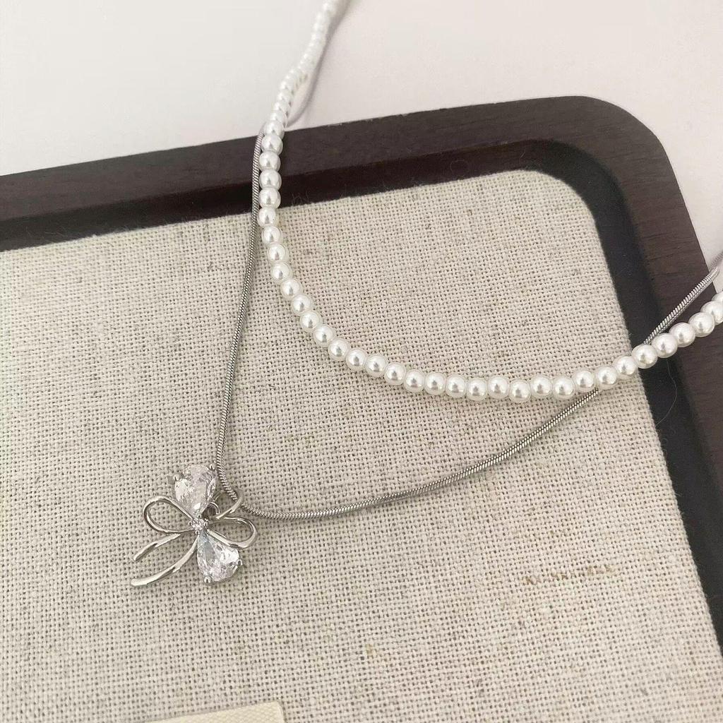 Elegant Double-Layer Pearl Bow Knot Necklace - Chic & Stylish Statement Clavicle Chain