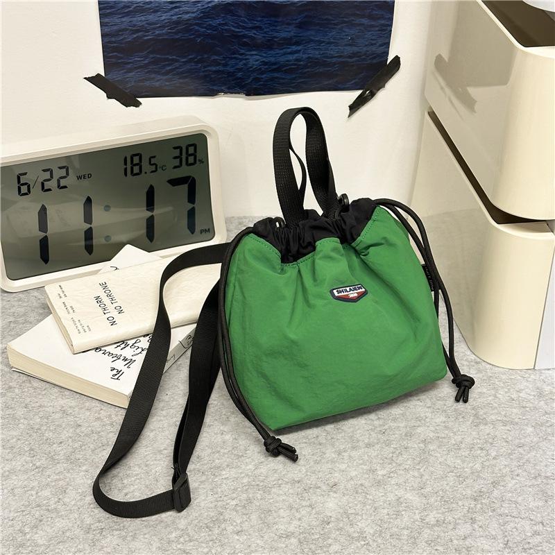 Japanese casual oblique span bag 2025 new Korean version fashionable versatile commuter sports small bag tooling shoulder bucket bag
