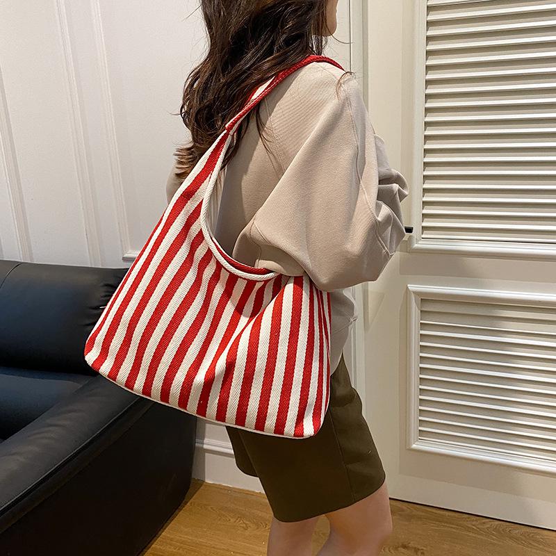 Small fresh striped handbag shoulder large capacity casual bag new women's bag messenger bag bucket bag