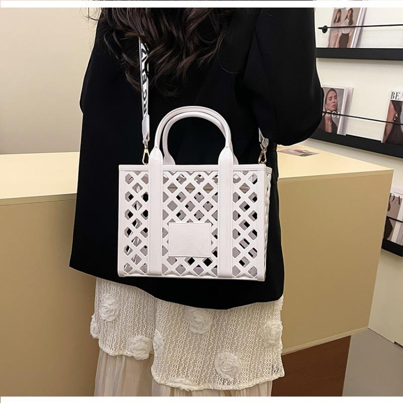 Mode Bonbonfarbe Strandtasche Damen neue personalisierte hohle Handtasche Nische Schultertasche Umhängetasche